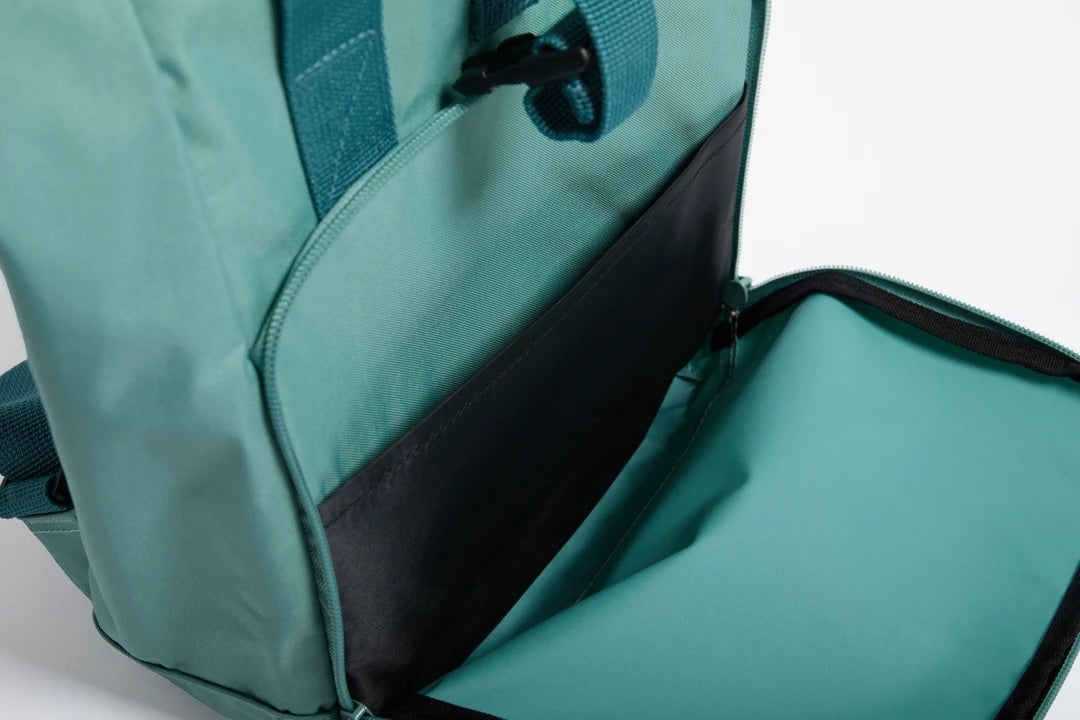 Teal backpack with a black interior on a white background