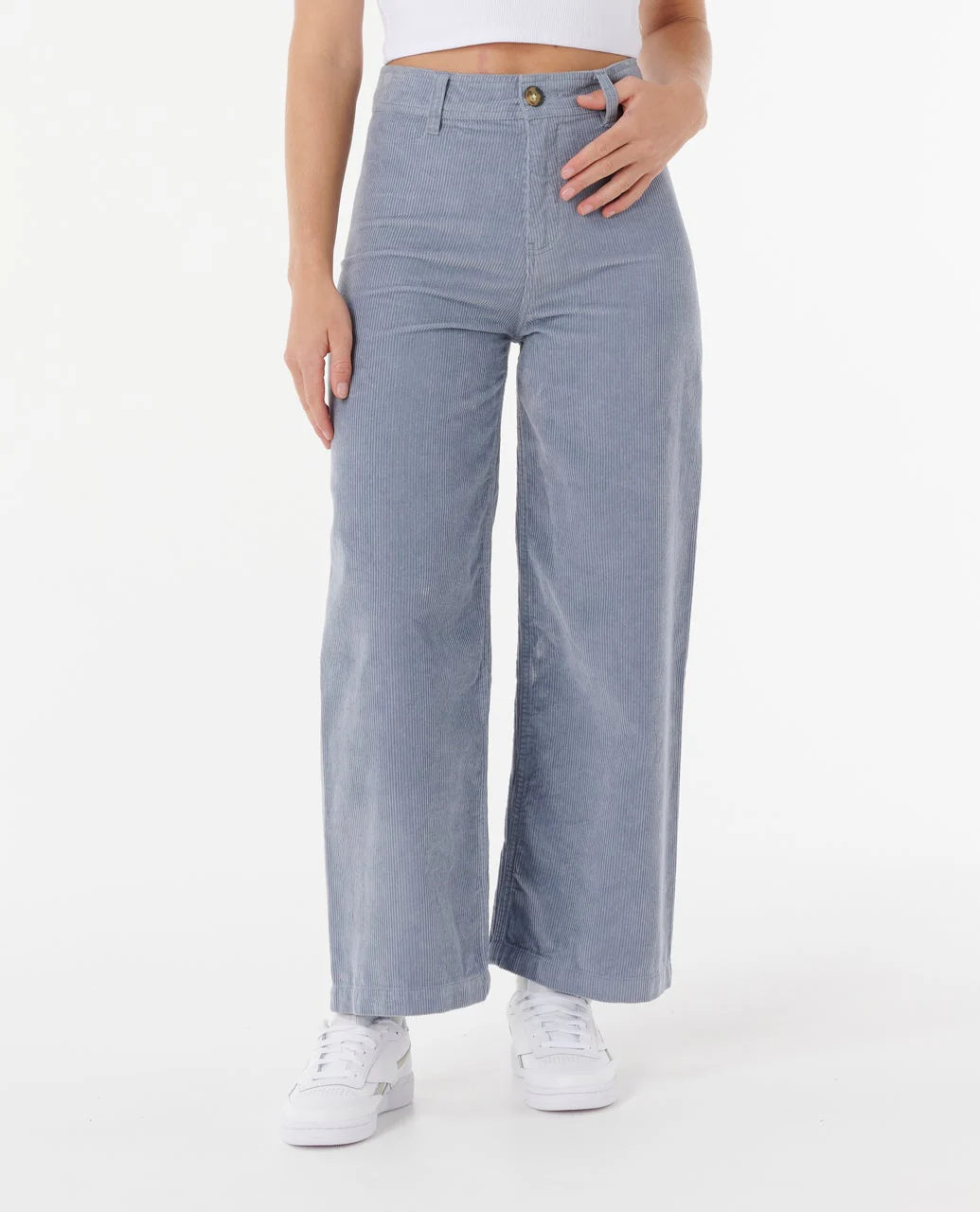 woman wearing a pair of rip curl stevie corduroy trousers