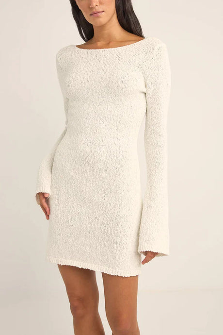 woman wearing a white rhythm adele knit mini dress