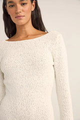 close up of the fabric on a rhythm adele long sleeve knit mini dress