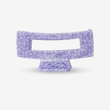 sasstie Purple decorative hair clip with a textured surface on a white background