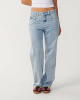 Rip Curl Aggie Light blue jeans worn by a person on a white background