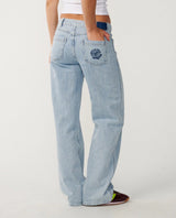 Rip Curl Light blue aggie jeans worn by a person on a white background
