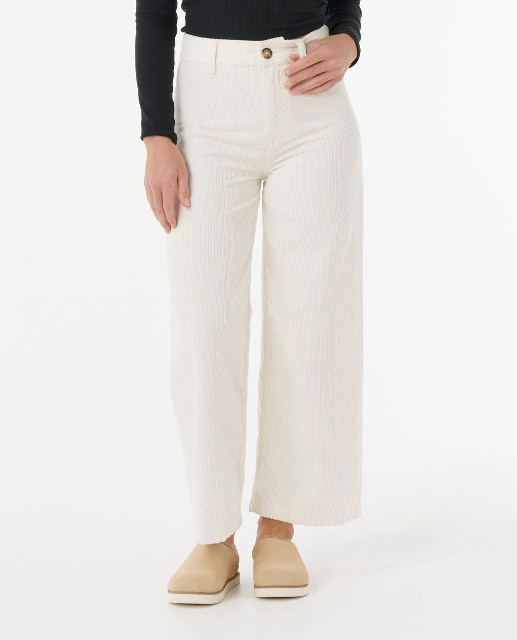 Person wearing rip curl stevie cord pants on a white background