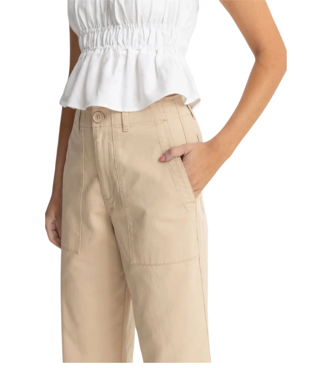 rhythm fatigue beige pants worn by a woman on a white background