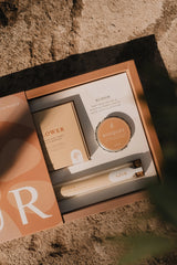 Gift set with 'R' design on a textured surface