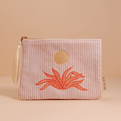 corduroy pouch with an embroidered design